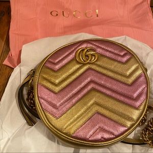 Gucci GG Marmont round crossbody bag.